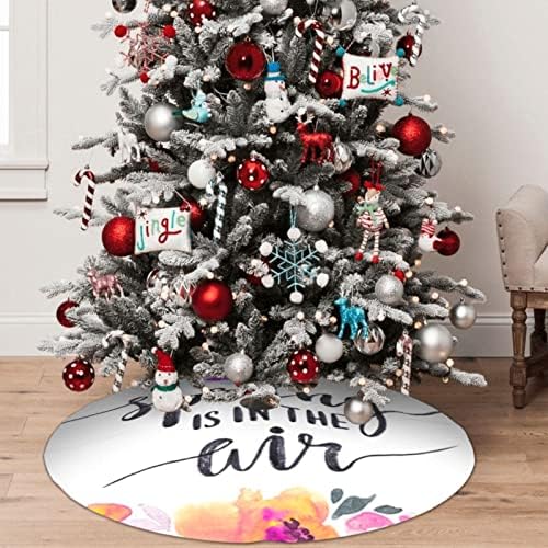 A primavera está na saia da árvore de Natal impressa no ar 48 para decoração de festa de férias de Natal